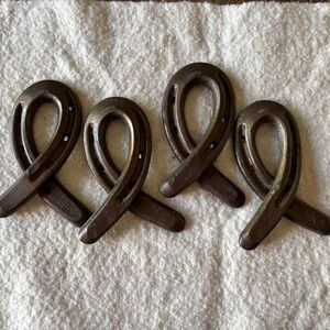 Set of Four Vintage Cast Iron Horseshoe Shaped Napkin Rings